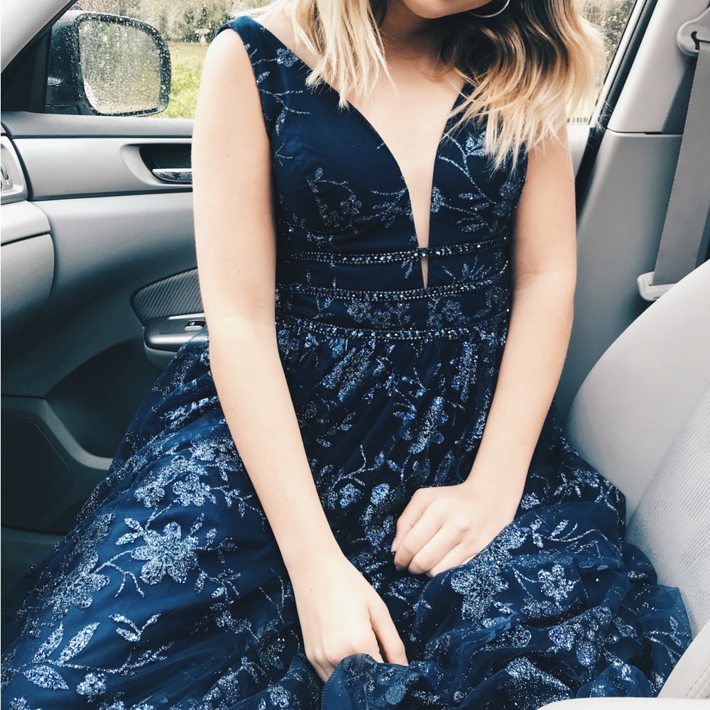 Beautiful prom dress has been altered, fits like a 4 absolutely love this dress